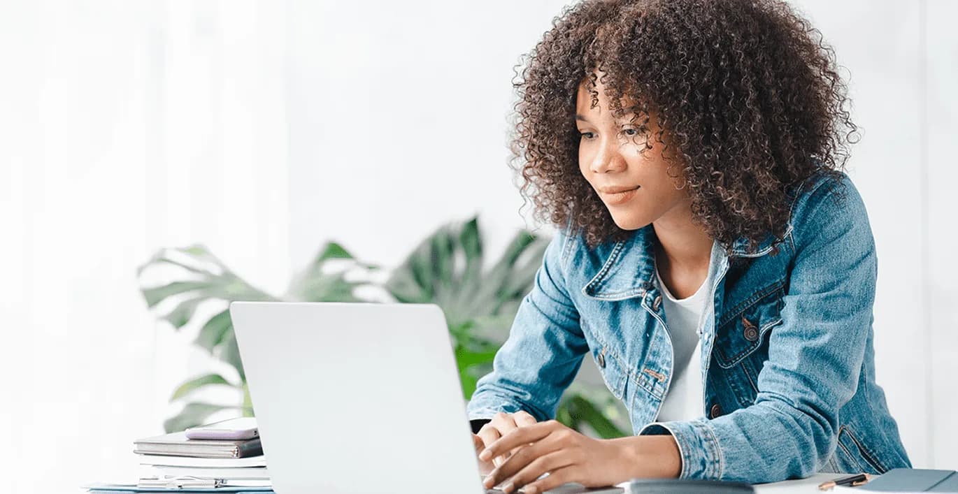 Michigan Online School Hero Girl looking at laptop